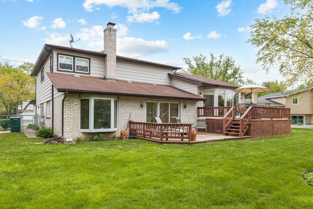 1452 Hemlock Knoll Ter, Northbrook, IL 60062 - rear view of house featuring a deck, a chimney, brick siding, and roof with shingles