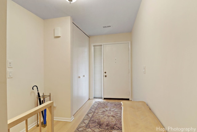 1704 Wildberry Dr Unit F, Glenview, IL 60025 - corridor with light wood finished floors and baseboards