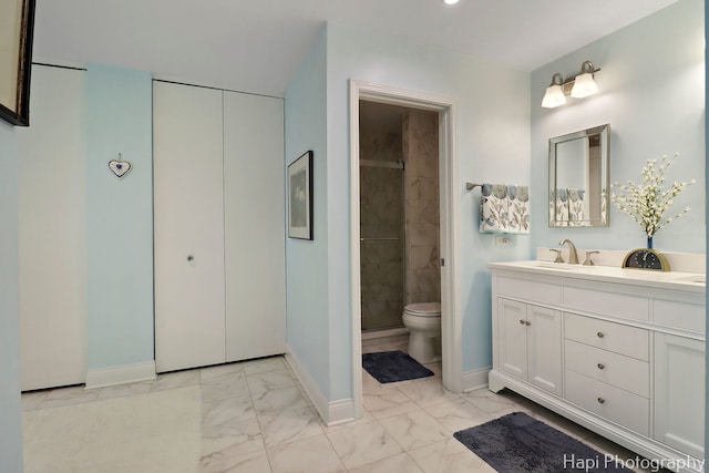 1704 Wildberry Dr Unit F, Glenview, IL 60025 - bathroom with marble finish floors, vanity, toilet, baseboards, and tiled shower