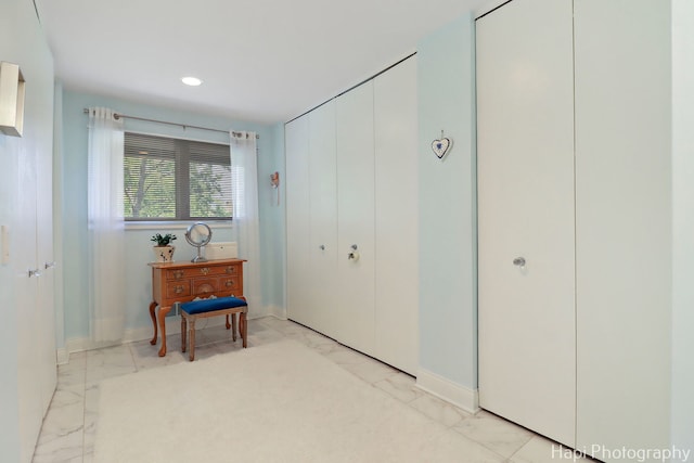 1704 Wildberry Dr Unit F, Glenview, IL 60025 - corridor with light marble finish flooring, baseboards, and recessed lighting