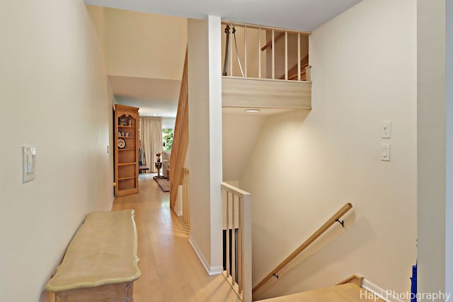 1704 Wildberry Dr Unit F, Glenview, IL 60025 - hallway with an upstairs landing and wood finished floors