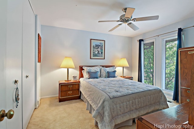 1704 Wildberry Dr Unit F, Glenview, IL 60025 - bedroom featuring light colored carpet, baseboards, and ceiling fan