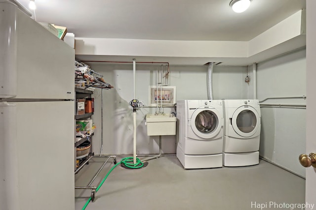 1704 Wildberry Dr Unit F, Glenview, IL 60025 - laundry room featuring independent washer and dryer and a sink