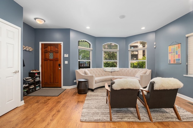 1828 N California Ave, Chicago, IL 60647 - living area with light wood-style floors and recessed lighting