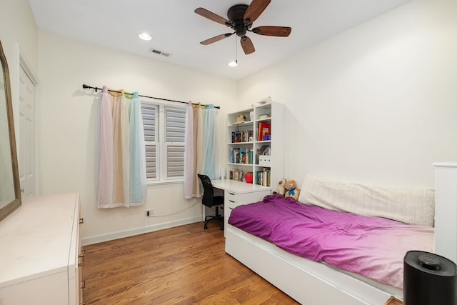 1828 N California Ave, Chicago, IL 60647 - bedroom with light wood-style flooring, a desk, a ceiling fan, and recessed lighting