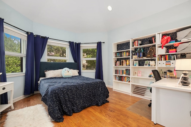 1828 N California Ave, Chicago, IL 60647 - bedroom featuring wood finished floors and a desk