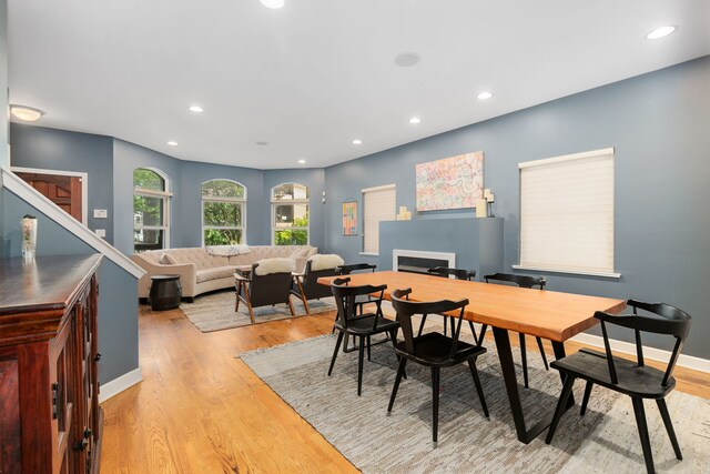 1828 N California Ave, Chicago, IL 60647 - dining room with a fireplace, light wood-style flooring, and recessed lighting