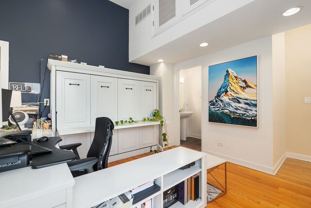 1828 N California Ave, Chicago, IL 60647 - home office featuring light wood finished floors, a towering ceiling, and recessed lighting