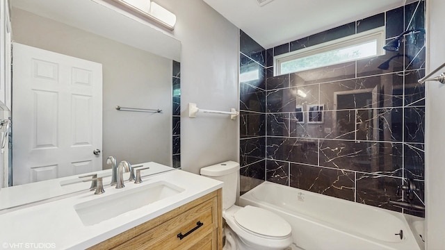 154 Wildflower Ln, Round Lake Beach, IL 60073 - bathroom featuring vanity, toilet, and tub / shower combination