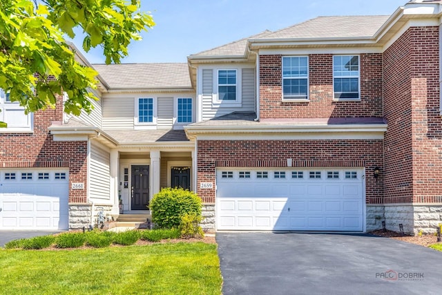2659 Dunraven Ave, Naperville, IL 60540 - view of front facade featuring asphalt driveway, an attached garage, and brick siding
