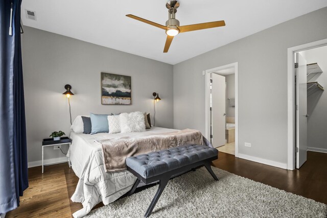 2035 W Crystal St Unit 3, Chicago, IL 60622 - bedroom featuring a spacious closet, wood finished floors, baseboards, a ceiling fan, and ensuite bath
