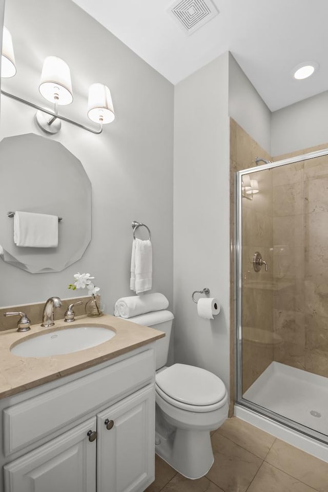 2035 W Crystal St Unit 3, Chicago, IL 60622 - full bath featuring vanity, a stall shower, toilet, and tile patterned floors