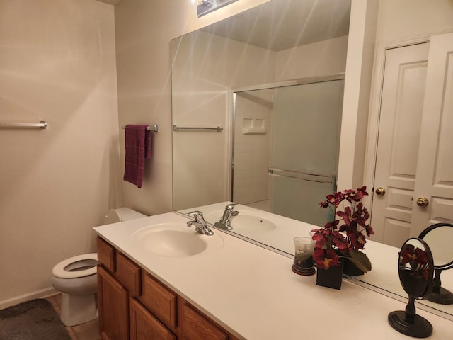 152 W Chatham Ln, Round Lake, IL 60073 - full bathroom with vanity, toilet, an enclosed shower, and baseboards