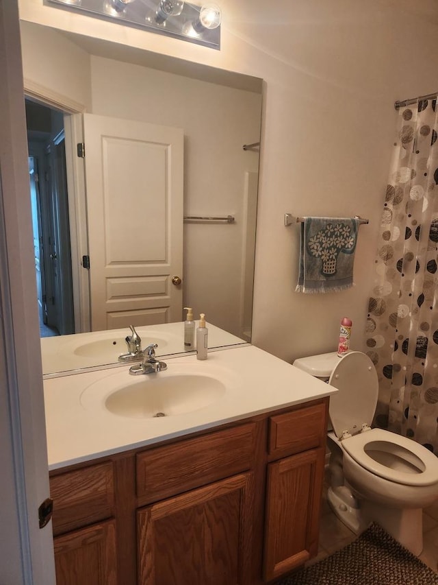 152 W Chatham Ln, Round Lake, IL 60073 - bathroom featuring vanity, toilet, and a shower with curtain