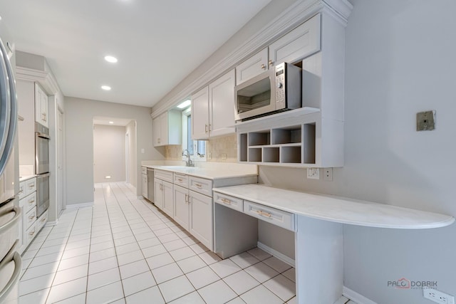 15 Highview Cir, Hawthorn Woods, IL 60047 - kitchen featuring appliances with stainless steel finishes, light countertops, tasteful backsplash, recessed lighting, and light tile patterned floors