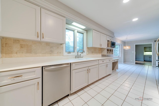 15 Highview Cir, Hawthorn Woods, IL 60047 - kitchen with appliances with stainless steel finishes, a sink, tasteful backsplash, light tile patterned floors, and light countertops