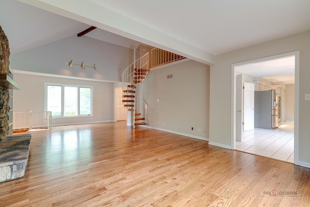 15 Highview Cir, Hawthorn Woods, IL 60047 - unfurnished living room featuring light wood-type flooring, stairs, and baseboards