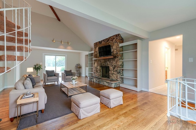15 Highview Cir, Hawthorn Woods, IL 60047 - living room featuring wood finished floors, a fireplace, baseboards, and stairway