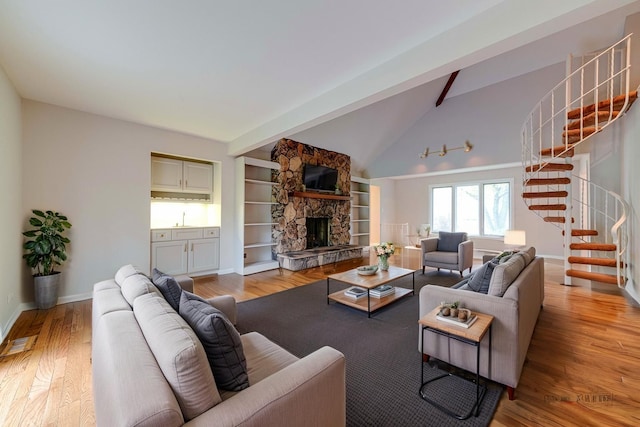 15 Highview Cir, Hawthorn Woods, IL 60047 - living room featuring stairway, a fireplace, wood finished floors, and baseboards