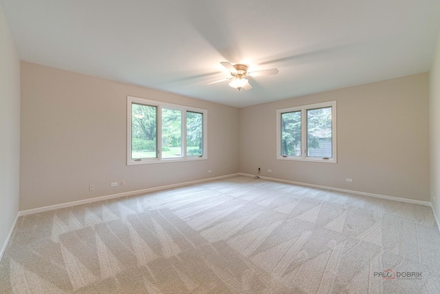 15 Highview Cir, Hawthorn Woods, IL 60047 - unfurnished room with light colored carpet, baseboards, and ceiling fan