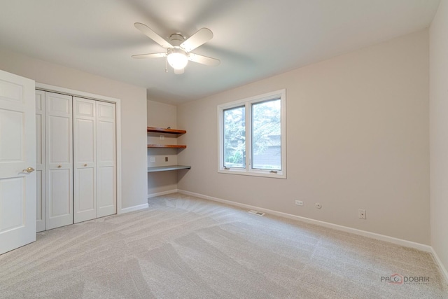 15 Highview Cir, Hawthorn Woods, IL 60047 - unfurnished bedroom featuring light carpet, baseboards, a closet, and a ceiling fan