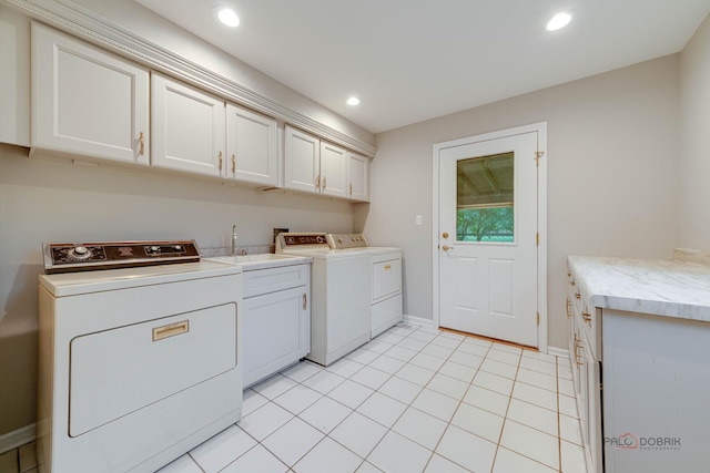 15 Highview Cir, Hawthorn Woods, IL 60047 - washroom with washing machine and dryer, cabinet space, baseboards, recessed lighting, and light tile patterned floors
