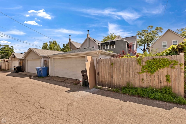4042 N Kenneth Ave, Chicago, IL 60641 - view of front of home with roof with shingles and a garage