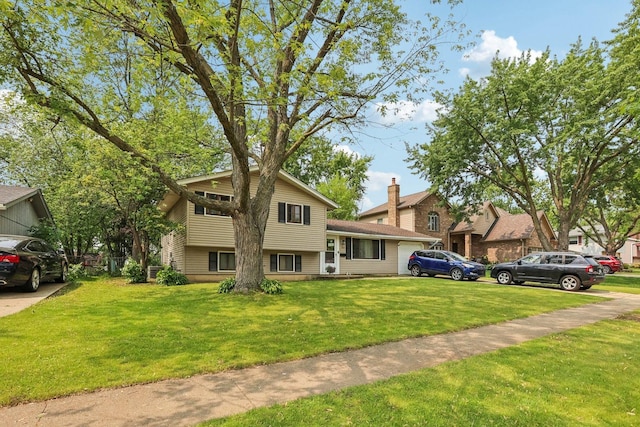 917 Aimtree Pl, Schaumburg, IL 60194 - tri-level home with a front yard and an attached garage