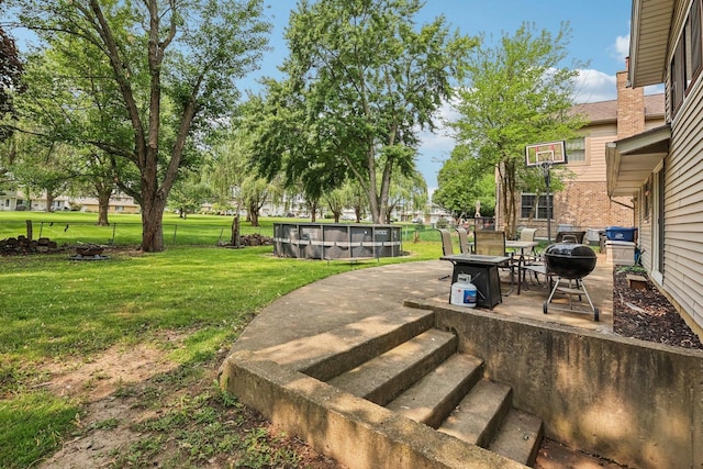 917 Aimtree Pl, Schaumburg, IL 60194 - view of green lawn featuring an outdoor fire pit, a patio area, and an outdoor pool
