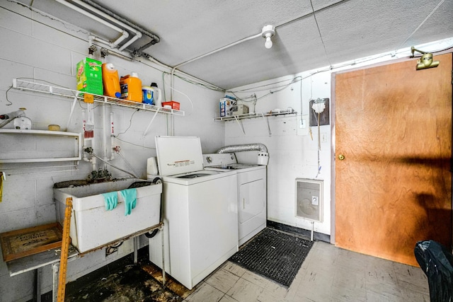9802 S Karlov Ave Unit A, Oak Lawn, IL 60453 - washroom featuring washer and clothes dryer and concrete block wall