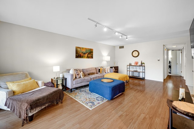 9802 S Karlov Ave Unit A, Oak Lawn, IL 60453 - living room featuring track lighting and wood finished floors