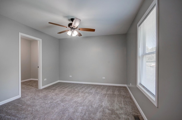 382 W 3rd St, Braidwood, IL 60408 - carpeted empty room with ceiling fan and baseboards