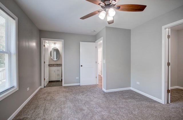 382 W 3rd St, Braidwood, IL 60408 - unfurnished bedroom featuring carpet flooring, ensuite bath, and ceiling fan