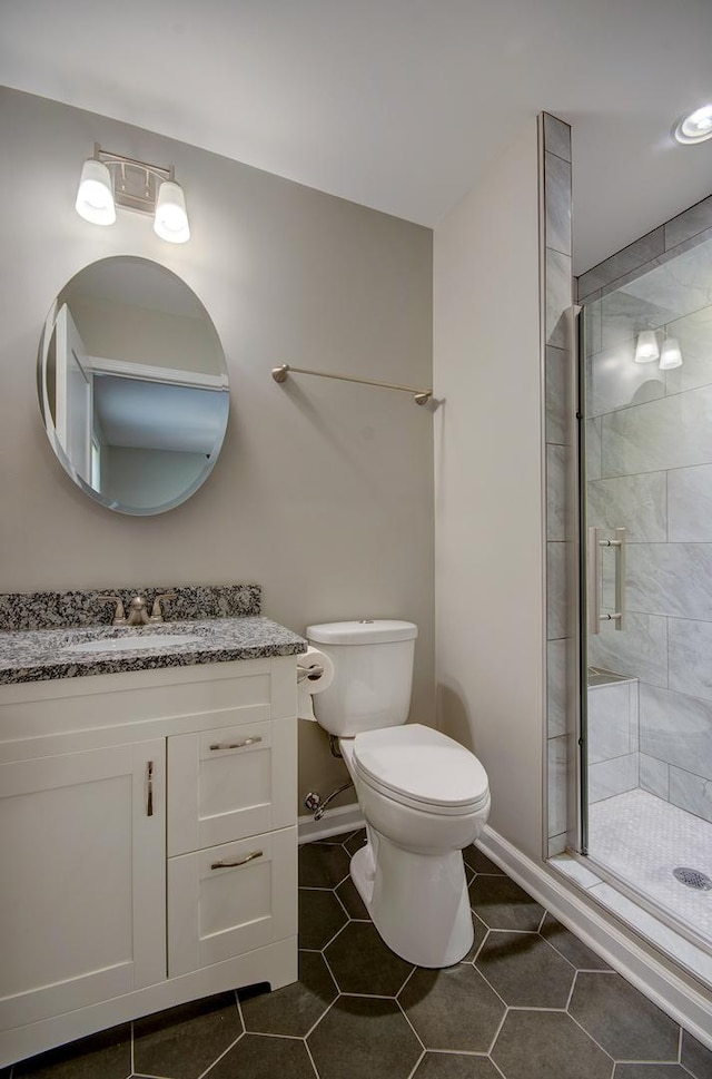 382 W 3rd St, Braidwood, IL 60408 - bathroom featuring vanity, a shower stall, and tile patterned flooring