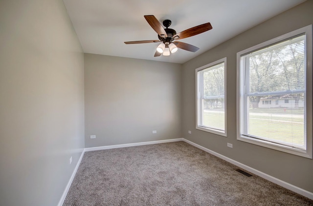 382 W 3rd St, Braidwood, IL 60408 - carpeted spare room featuring baseboards and ceiling fan