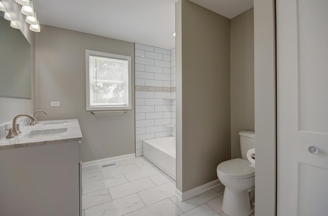 382 W 3rd St, Braidwood, IL 60408 - bathroom with double vanity, marble look tiles, and washtub / shower combination
