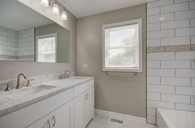 382 W 3rd St, Braidwood, IL 60408 - full bathroom featuring marble finish flooring, plenty of natural light, double vanity, and shower / bathtub combination