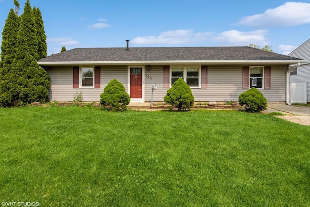 703 Hudson Ave, Romeoville, IL 60446 - ranch-style house with a front yard and a shingled roof