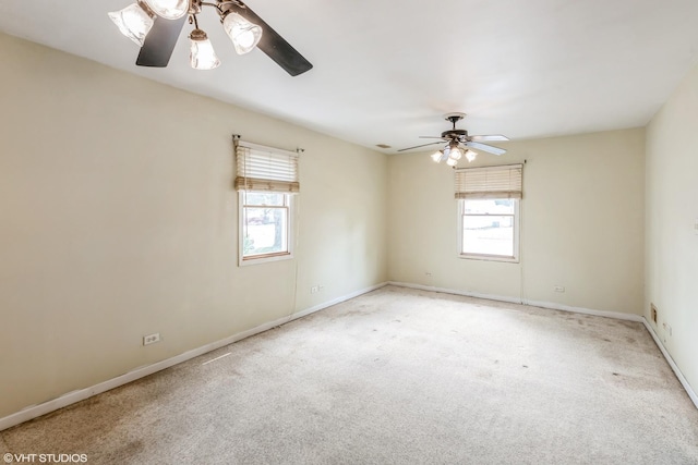 703 Hudson Ave, Romeoville, IL 60446 - carpeted empty room with ceiling fan and baseboards