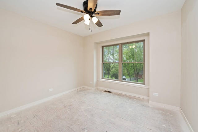 2619 Sanctuary Ln, Spring Grove, IL 60081 - spare room with a ceiling fan and baseboards