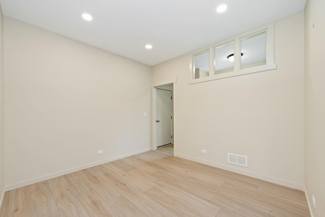 2619 Sanctuary Ln, Spring Grove, IL 60081 - spare room with light wood-type flooring and recessed lighting