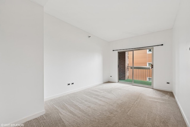 720 W Randolph St Unit 707, Chicago, IL 60661 - spare room featuring carpet flooring and baseboards
