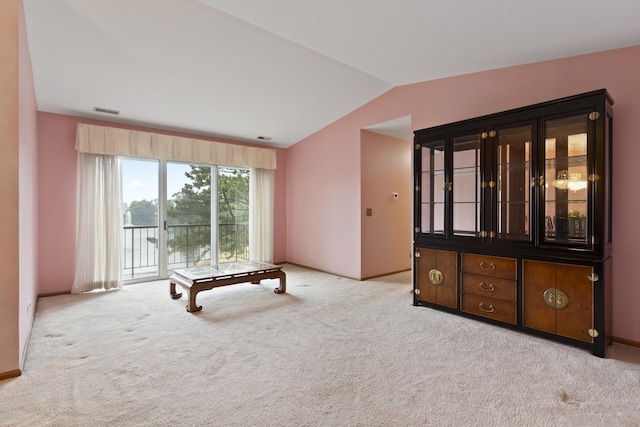 304 Memory Ln Unit 4, Westmont, IL 60559 - carpeted spare room featuring vaulted ceiling and baseboards