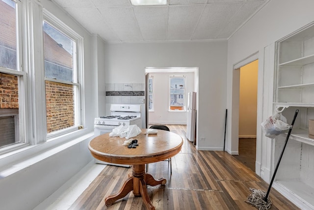 2653 W 21st St, Chicago, IL 60608 - dining space featuring wood finished floors and baseboards