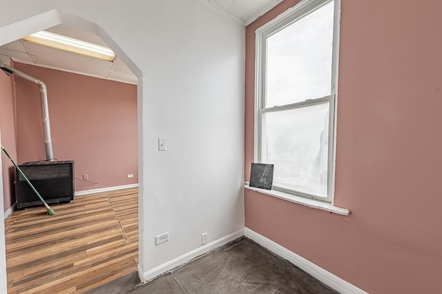 2653 W 21st St, Chicago, IL 60608 - empty room featuring baseboards and a wood stove