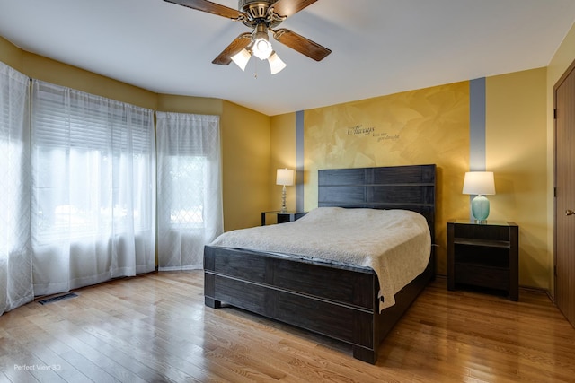 3018 Coastal Dr, Aurora, IL 60503 - bedroom with wood finished floors and a ceiling fan