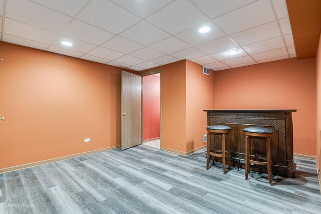 3018 Coastal Dr, Aurora, IL 60503 - indoor dry bar with wood finished floors, a drop ceiling, and recessed lighting