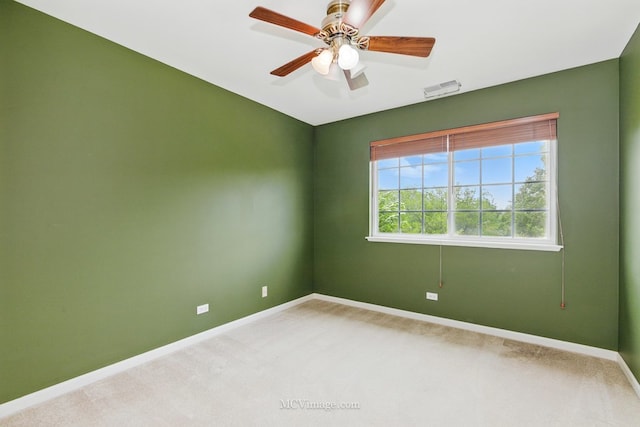 221 Willow Blvd, Willow Springs, IL 60480 - spare room with baseboards, light colored carpet, and a ceiling fan