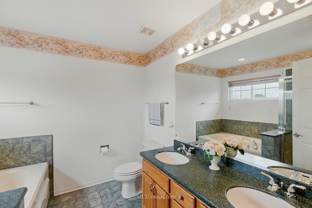 221 Willow Blvd, Willow Springs, IL 60480 - full bath with a garden tub, double vanity, a stall shower, baseboards, and toilet