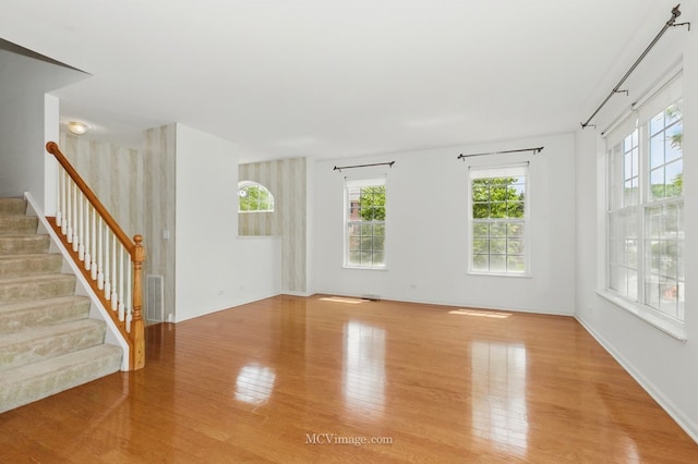221 Willow Blvd, Willow Springs, IL 60480 - unfurnished room with wood finished floors, stairs, and baseboards